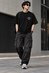 Black Neighborhood SS-6 Tee shirt, casual apparel, front view showing crew neckline and logo details.