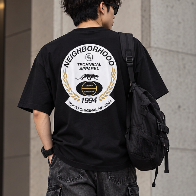 Black NEIGHBORHOOD SS-6 Tee shirt displayed on a flat surface, showcasing the front design and fabric texture.