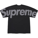 Supreme checkered black intarsia tee shirt featuring a bold black and white checkered pattern on the front.