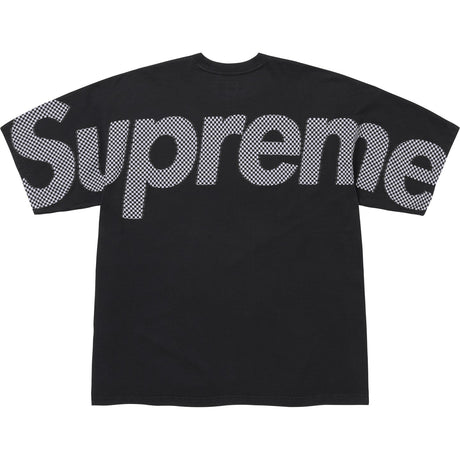 Supreme checkered black intarsia tee shirt featuring a bold black and white checkered pattern on the front.