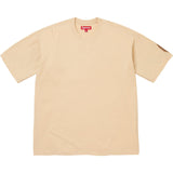 Supreme checkered intarsia tan T-shirt with geometric pattern, casual apparel featuring the iconic Supreme logo and design.