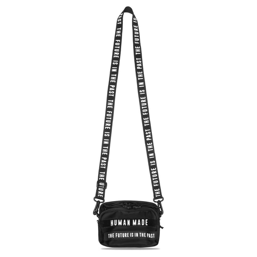 Black Human Made military mini sling bag with compact design, adjustable strap, and multiple compartments for everyday use.