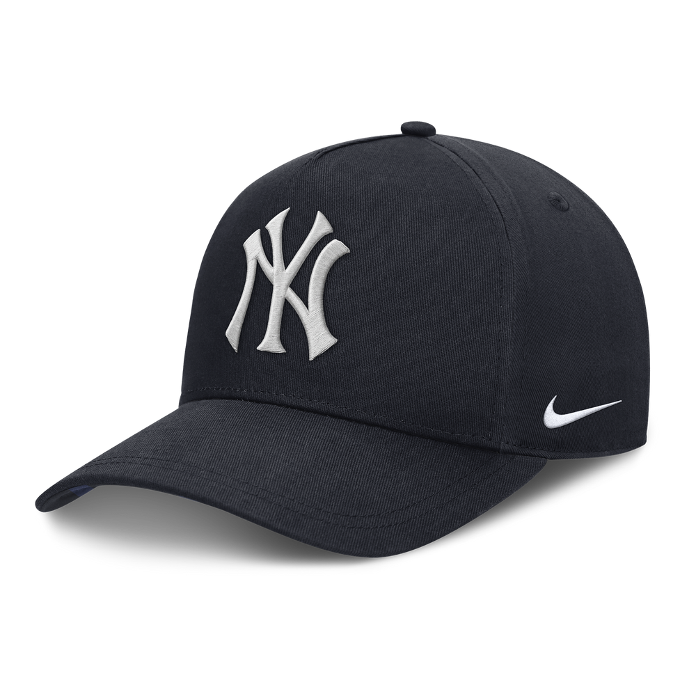 HUMAN MADE KAWS X Nike Club structured A-frame New York Yankees navy snapback cap with logo embroidery and adjustable strap