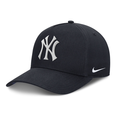 HUMAN MADE KAWS X Nike Club structured A-frame New York Yankees navy snapback cap with logo embroidery and adjustable strap