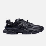 Black New Balance 9060 Mule sneakers, featuring a sleek, minimalist design with a comfortable fit and modern style.