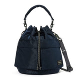 Porter Yoshida Japan Tanker 2-Way Tool Bag in navy, durable bag with multiple compartments for tools, brand logo visible.