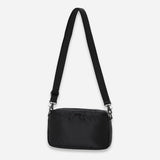Black Porter Yoshida Japan Tanker Sling Bag with adjustable strap and compact design, featuring durable material and sleek style.