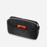 Black Porter Yoshida Japan Tanker Sling Bag with adjustable strap and multiple compartments, stylish and durable for everyday use.