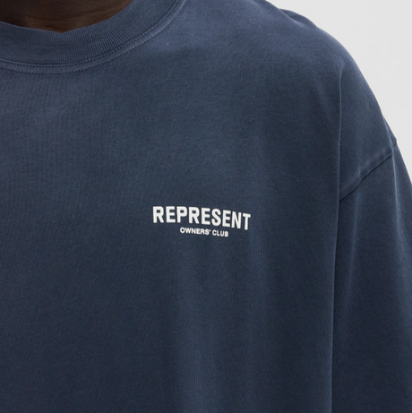 Black REPRESENT Owners Club Logo Tee featuring a bold graphic design on the front, casual and stylish for everyday wear.