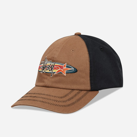 Stussy oval star brown cap, stylish headwear featuring the Stussy logo and adjustable strap, in a classic brown color.