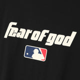 Fear of God Essentials MLB 90s Tee in white, casual apparel with MLB logo and classic 90s design.