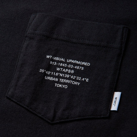 Black WTAPS Pocket Tee shirt with short sleeves and front pocket, made of cotton, displayed on a plain background.