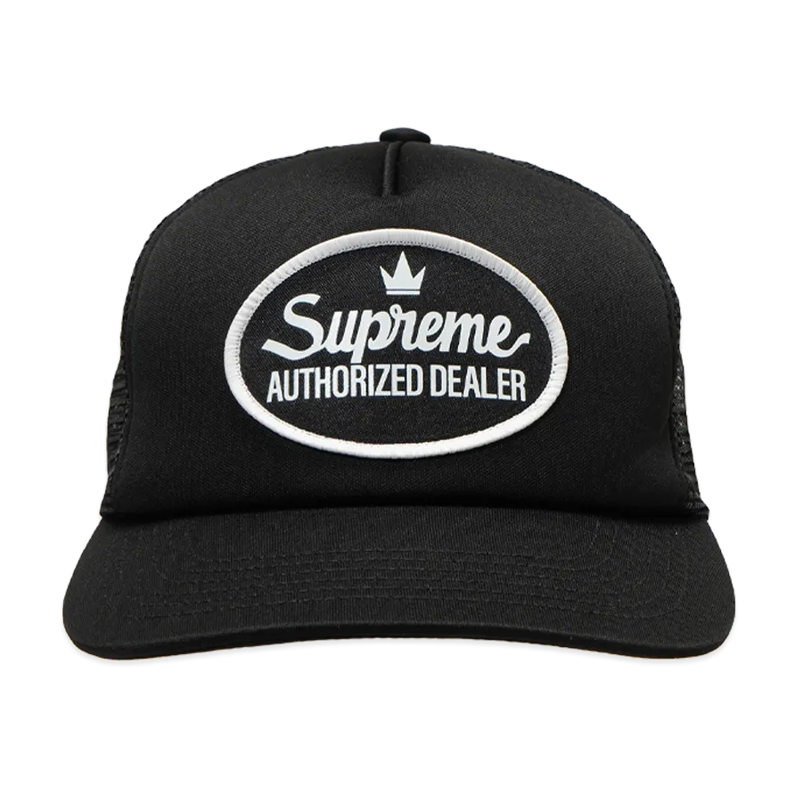 Black Supreme mesh trucker cap, a stylish headwear with breathable mesh panels and adjustable snapback closure.