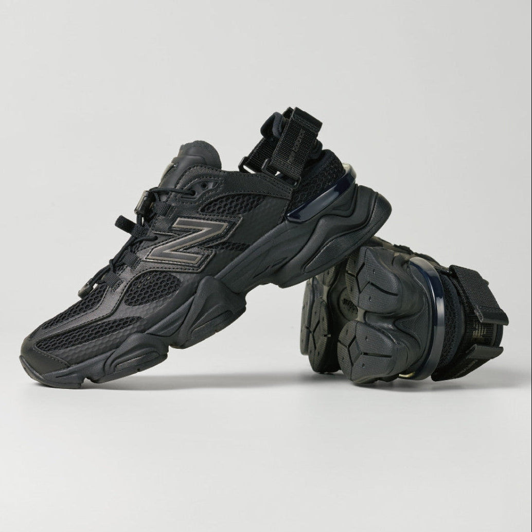 New Balance 9060 Mule sneakers in triple black with sleek design and comfortable fit, featuring black leather and sporty style.