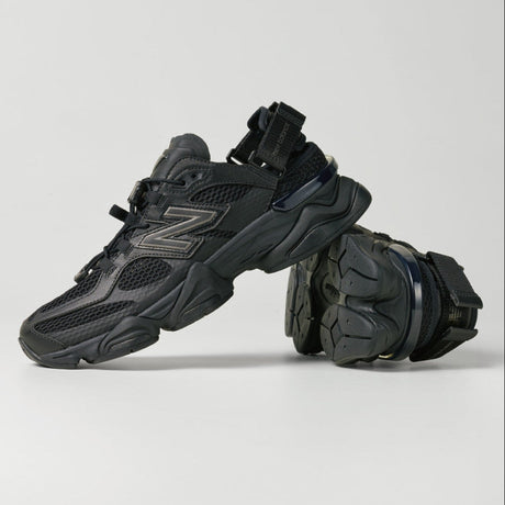 New Balance 9060 Mule sneakers in triple black with sleek design and comfortable fit, featuring black leather and sporty style.
