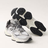 New Balance 9060 Mule Raincloud Castlerock sneakers, showing the stylish gray and white design with cushioned sole and slip-on style.