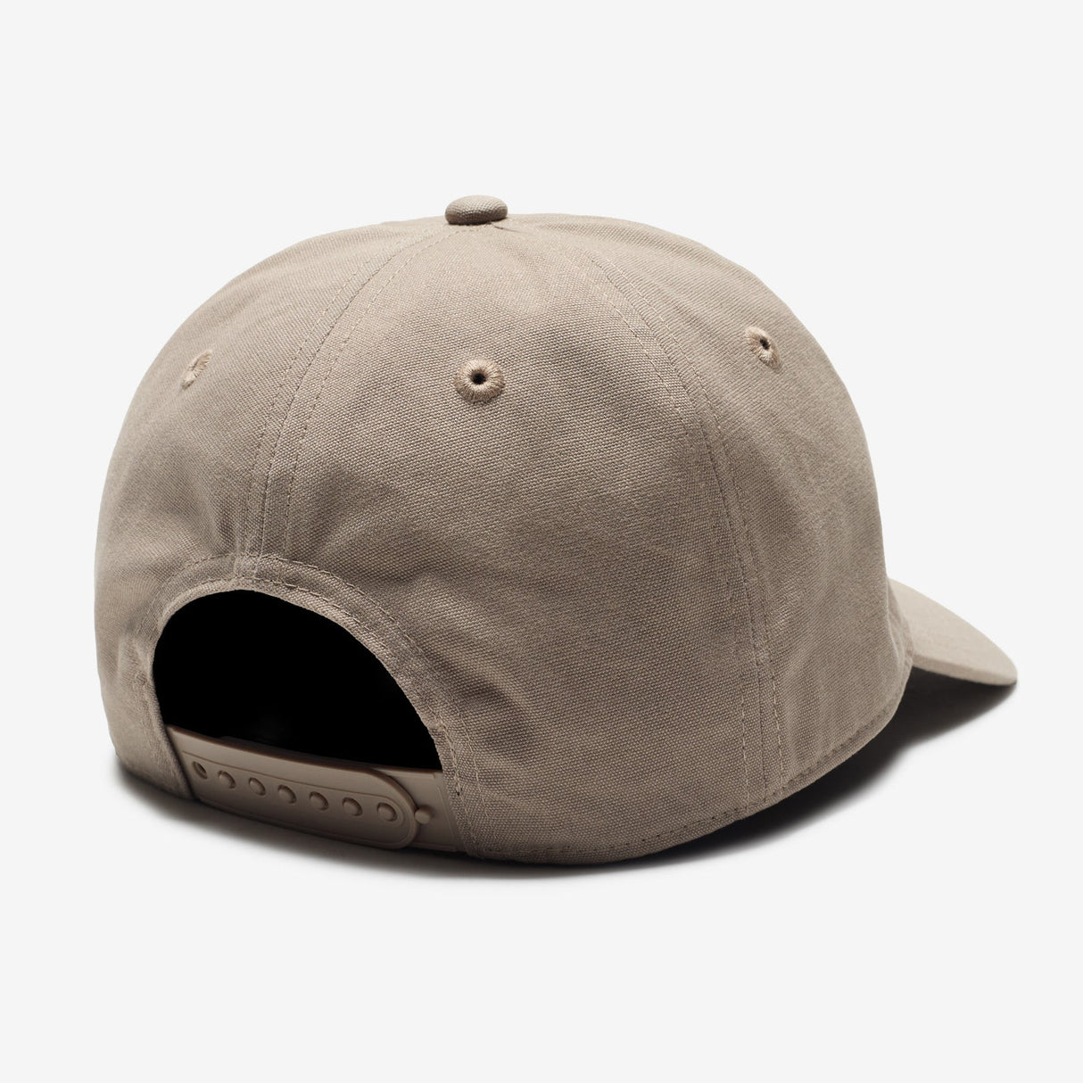 Undefeated Patch Logo Snapback hat in khaki with canvas material and adjustable strap, featuring brand patch detail.