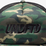 Undefeated Surplus Camo Trucker