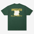 Forest green UNDEFEATED Trademark Tee featuring a classic logo on the front, displayed on a casual apparel model.