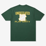 Forest green UNDEFEATED Trademark Tee featuring a classic logo on the front, displayed on a casual apparel model.