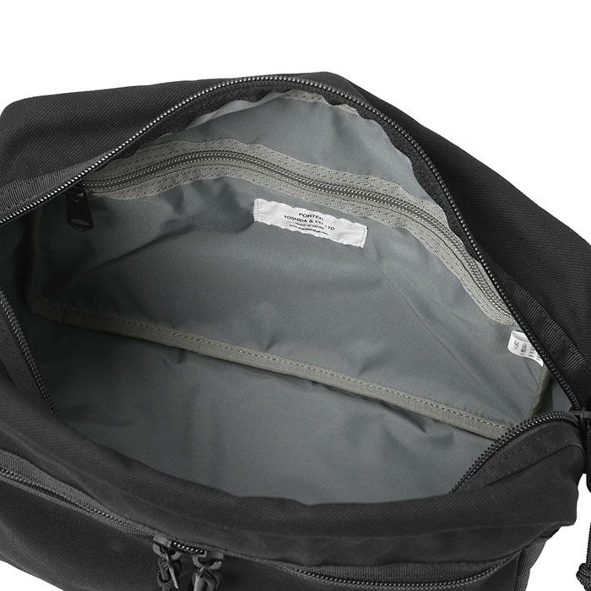 Porter Yoshida Japan Switch large shoulder bag in black with adjustable strap, durable nylon material, and minimalist design.