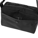 Porter Yoshida Japan Switch Shoulder Bag in black with adjustable strap and front zipper pocket, crafted from durable fabric.