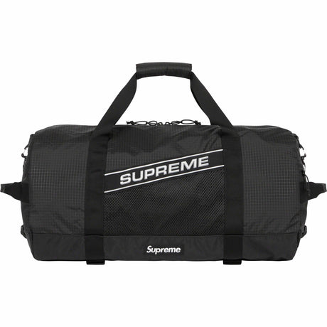 Supreme black reflective logo large duffle bag with 42L capacity, featuring durable material and spacious design for travel or gym use.