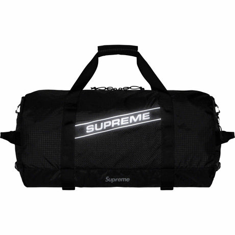 Supreme reflective logo large black duffle bag with 42L capacity, featuring a sleek design and sturdy handles for travel and sports.