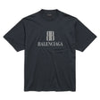 Black Balenciaga Nano BB Medium Fit Tee displayed on a hanger, showcasing the casual, oversized style and logo details.