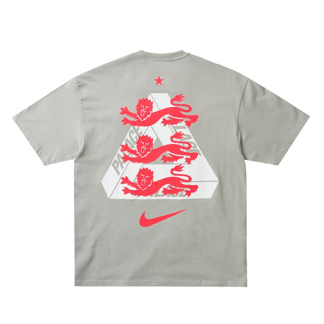 England Nike x Palace premium T-shirt in pewter grey, featuring Nike and Palace branding and a stylish casual fit.