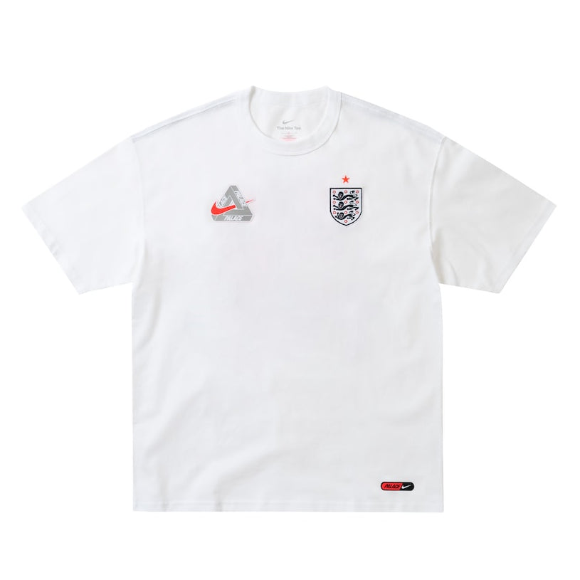 White Nike x Palace England T-shirt featuring England branding and logo, displayed flat on a plain background.