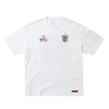 White Nike x Palace England T-shirt featuring England branding and logo, displayed flat on a plain background.