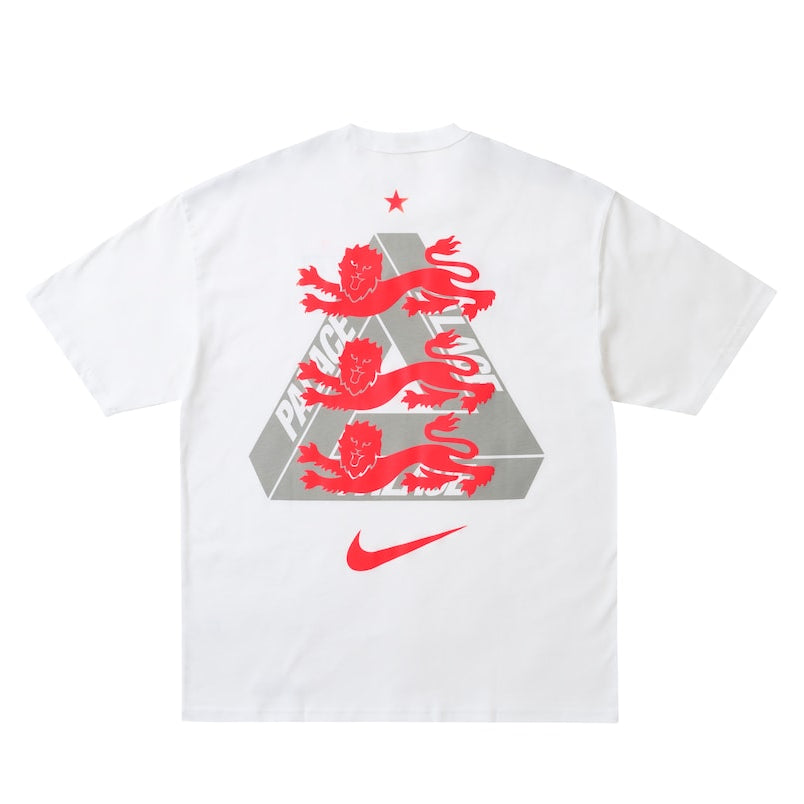White Nike Palace x England T-shirt featuring England logo and branding, displayed flat with visible design details.