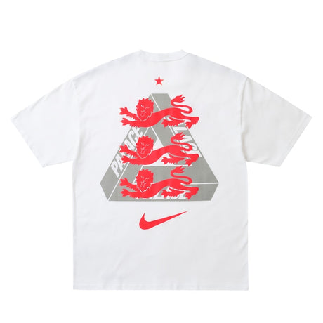 White Nike Palace x England T-shirt featuring England logo and branding, displayed flat with visible design details.