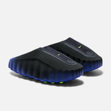 Nike Mind 001 Flyknit slide shoes in hyper royal, volt, and black with a sleek, lightweight design and breathable Flyknit material.
