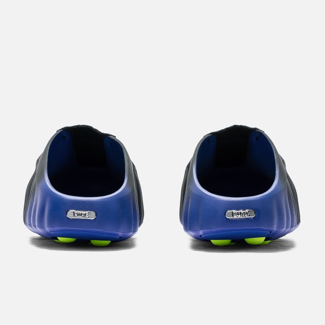 Nike Mind 001 Flyknit Slide shoes in hyper royal, volt, and black with breathable Flyknit material and sporty design.