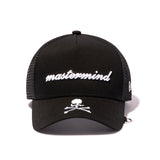 Black Mastermind Japan x New Era 9FORTY trucker cap with adjustable strap and embroidered logo, casual streetwear style.
