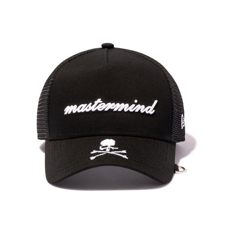 Black Mastermind Japan x New Era 9FORTY trucker cap with adjustable strap and embroidered logo, casual streetwear style.