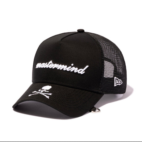Black Mastermind Japan X New Era 9FORTY A-Frame trucker cap with logo, casual streetwear style, front view.