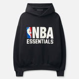 Black Fear of God Essentials NBA hoodie, casual apparel with NBA logo and comfortable fabric, displayed on a white background.