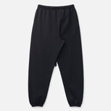 Fear Of God Essentials NBA black sweatpants, casual athletic apparel with logo details, shown on a plain background.
