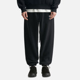 Black Fear Of God Essentials X NBA sweatpants with elastic waistband and logo detail, casual athletic apparel for men and women.