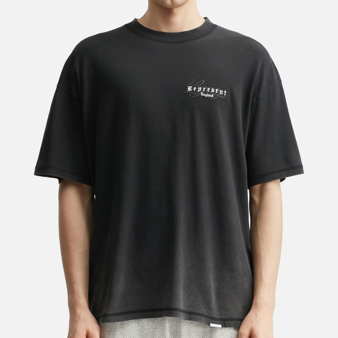 Black Represent Legacy Overprint Tee featuring a bold print design on the front, casual fit, and soft cotton fabric.