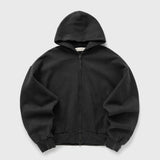 Fear Of God Essentials logo zip-up hoodie in vintage black, featuring a classic design and front logo detail.