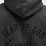 Fear Of God Essentials vintage black zip-up hoodie with logo, featuring a classic design and comfortable fit.