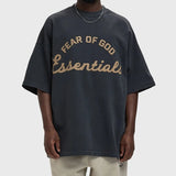 Fear of God Essentials Training 90s Heavyweight Tee in Iron Grey, casual men's apparel with a relaxed fit and soft fabric.