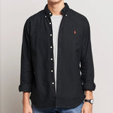 Black Polo Ralph Lauren classic fit Oxford long sleeve shirt displayed on a hanger, showcasing button-down collar and tailored fit.
