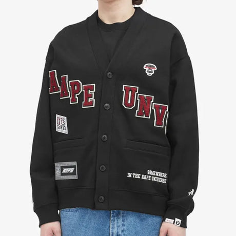 AAPE by BATHING APE UNVS cardigan, stylish knitwear, featuring the brand's logo and a modern design, displayed on a mannequin.