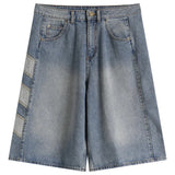Adidas men's denim shorts in classic indigo color, featuring a relaxed fit and casual style.