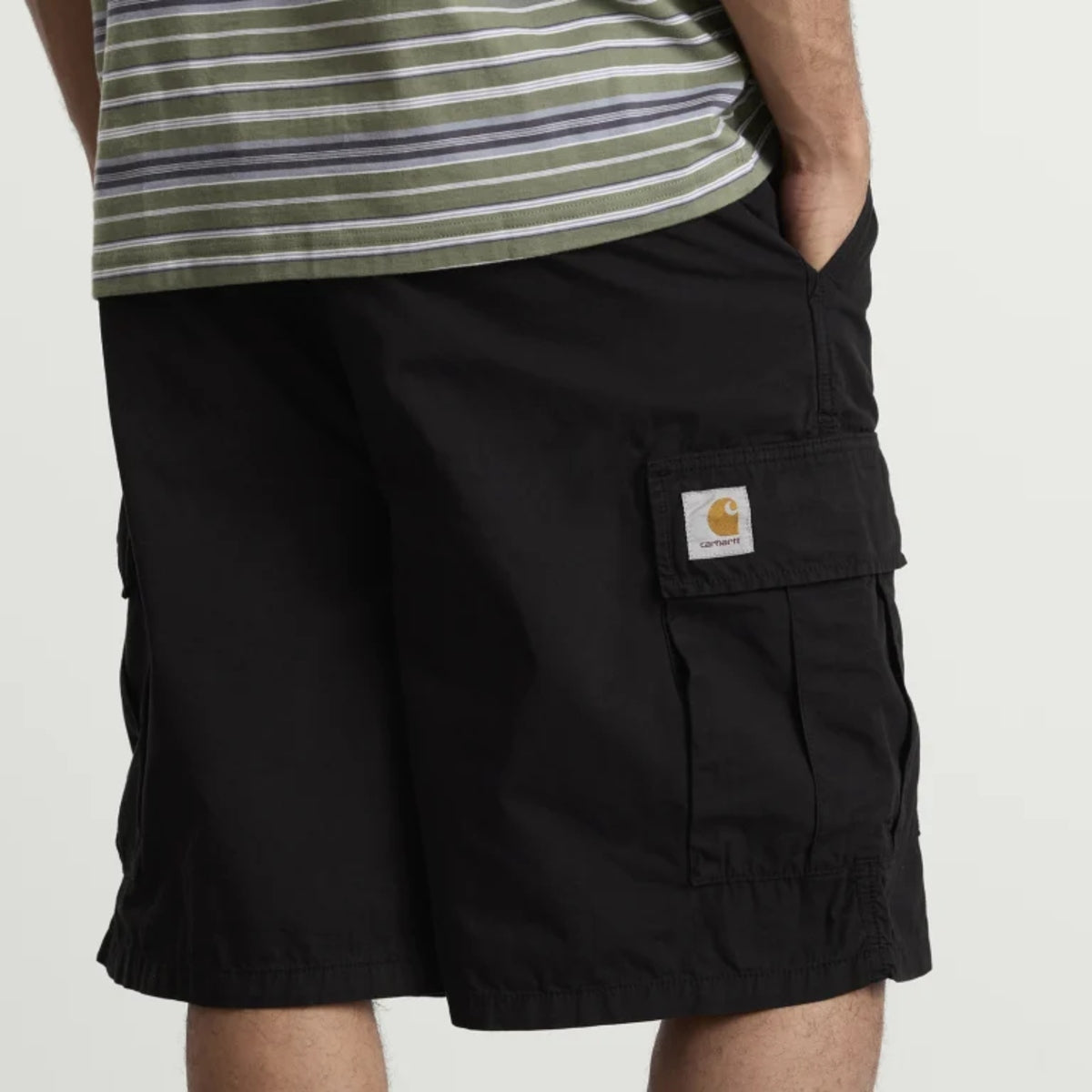 Black Carhartt WIP Mandler Cargo Shorts showing multiple front and side pockets, made of durable fabric for casual wear.